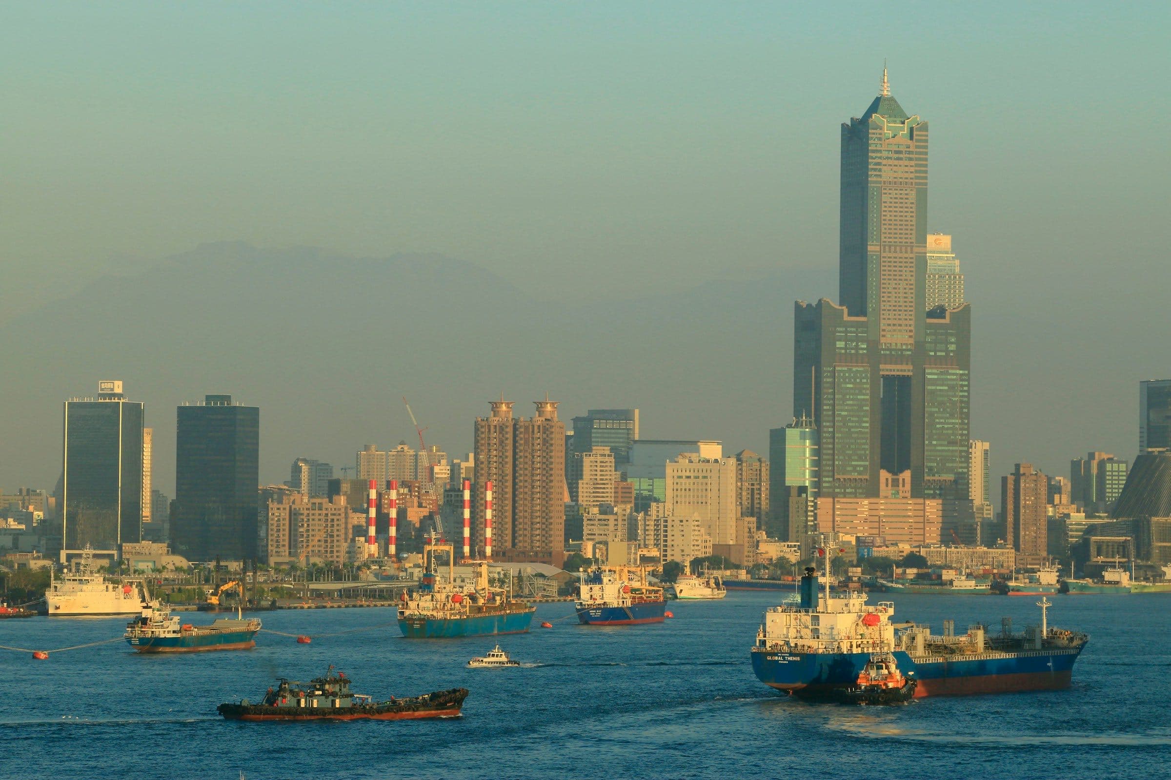 Kaohsiung harbor in hazy green-gold light